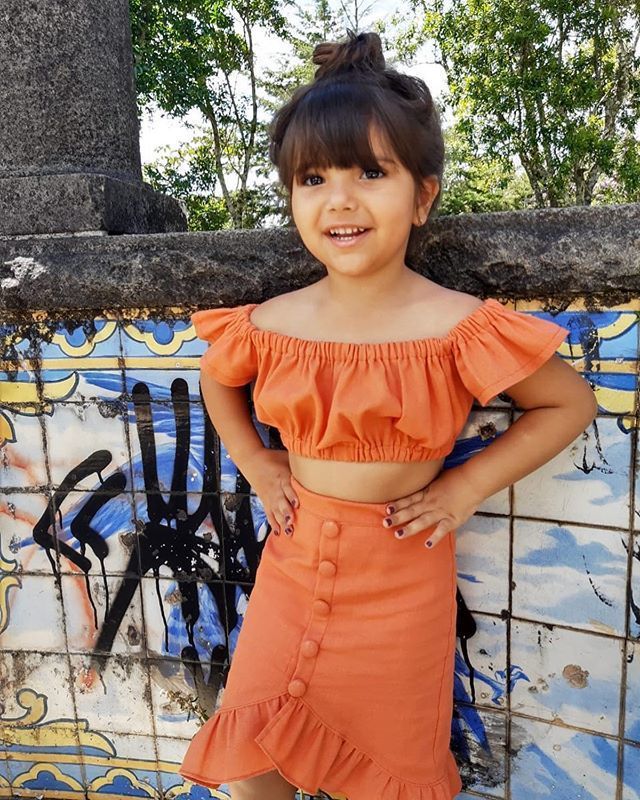 Girl orange skirt suit