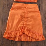 Girl orange skirt suit