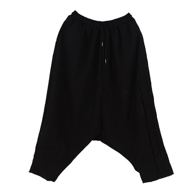 Dark designer low crotch straddles