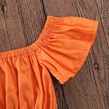 Girl orange skirt suit