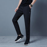 Mens Fashion Solid Color Loose Casual Pants - Almoni Express