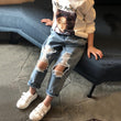 Small And Medium-sized Children's Ripped Loose Jeans - Almoni Express